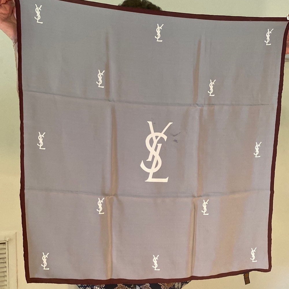 Yves Saint Laurent gray scarf with burgundy boarder.